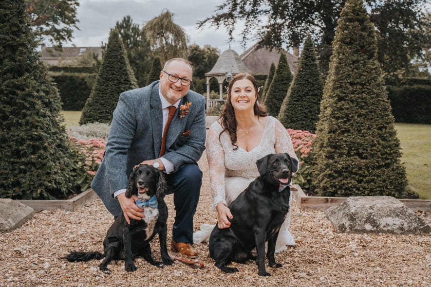 Bride and groom with dogs