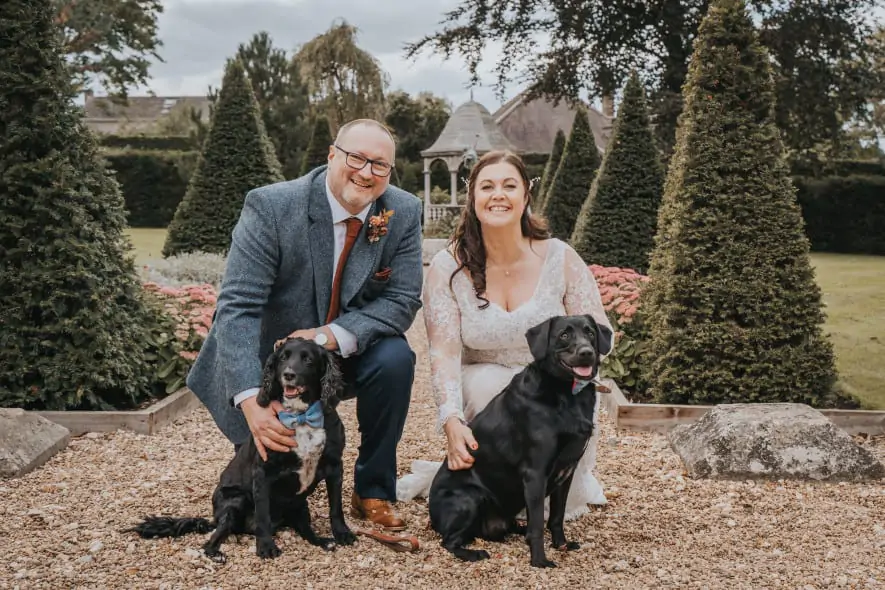 Bride and groom with dogs
