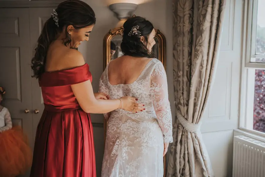 Bride and bridesmaid
